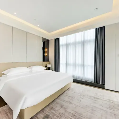 Executive Three-Bedroom Gathering Suite | Separate Bedrooms | Spacious Living Room | Two Bathrooms