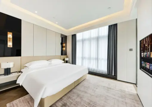 Executive Three-Bedroom Gathering Suite | Separate Bedrooms | Spacious Living Room | Two Bathrooms