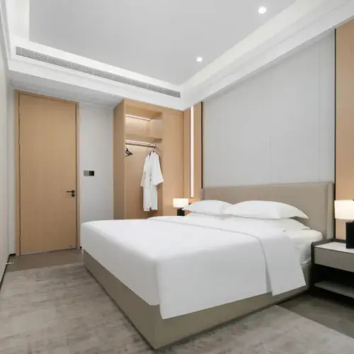 Executive Three-Bedroom Gathering Suite | Separate Bedrooms | Spacious Living Room | Two Bathrooms